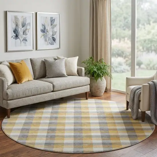 8' Gray Ivory And Gold Plaid Washable Round Rug With UV Protection Photo 1