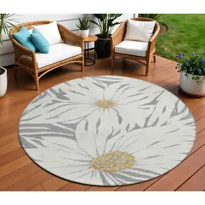 Photo of 8' Gray Ivory And Gold Round Floral Washable Indoor Outdoor Area Rug