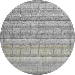Photo of 8' Gray Ivory And Gold Striped Washable Round Rug With UV Protection