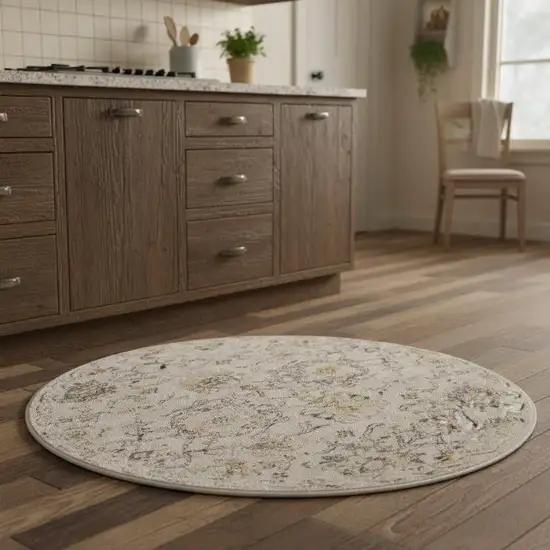 4' Gray Ivory And Yellow Floral Distressed Round Rug Photo 1