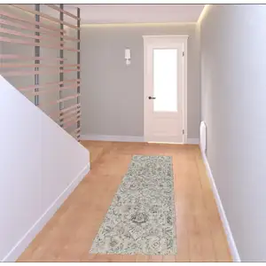 Photo of 8' Gray Ivory And Yellow Floral Distressed Runner Rug