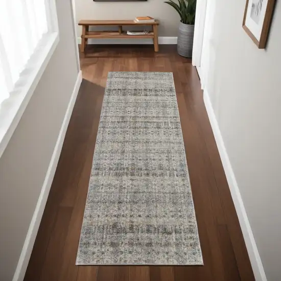 8' Gray Ivory and Blue Abstract Power Loom Worn Faded Runner Rug With Fringe Photo 1