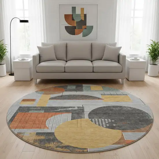 8' Gray Orange And Gold Geometric Washable Round Rug With UV Protection Photo 2