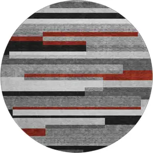 Photo of 8' Gray Red And Silver Striped Washable Round Rug With UV Protection