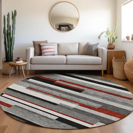 8' Gray Red And Silver Striped Washable Round Rug With UV Protection Photo 4