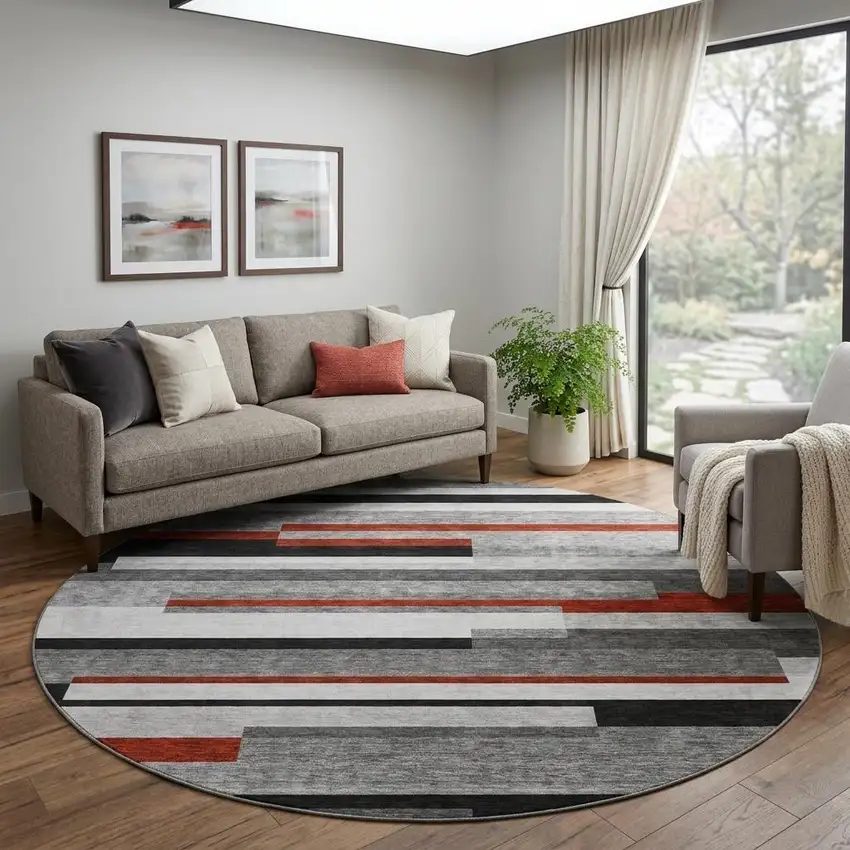 8' Gray Red And Silver Striped Washable Round Rug With UV Protection Photo 1