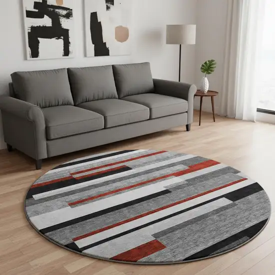 8' Gray Red And Silver Striped Washable Round Rug With UV Protection Photo 2