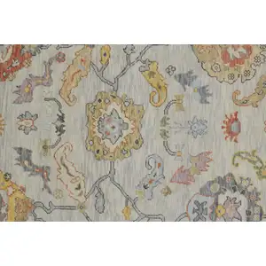 Photo of 8' Gray Red and Yellow Wool Oriental Hand Knotted Runner Rug With Fringe