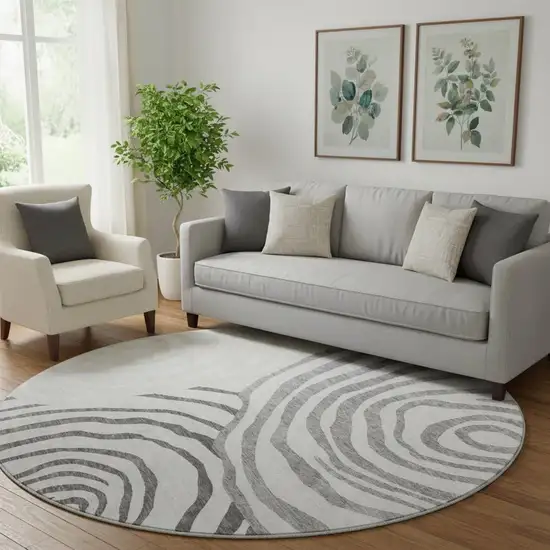 8' Gray Silver And Beige Abstract Washable Round Rug With UV Protection Photo 1