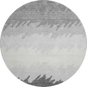Photo of 8' Gray Silver And Beige Striped Washable Round Rug With UV Protection