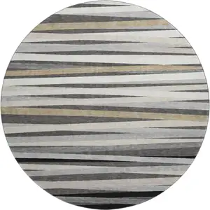 Photo of 8' Gray Silver And Beige Striped Washable Round Rug With UV Protection