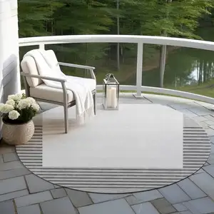 Photo of 8' Gray Silver And Black Round Striped Washable Indoor Outdoor Area Rug