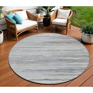 Photo of 8' Gray Silver And Blue Round Striped Washable Indoor Outdoor Area Rug