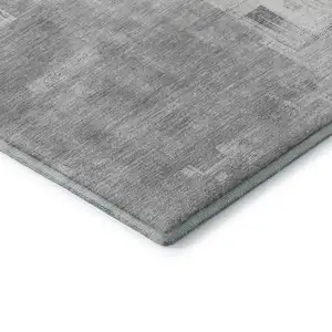 Photo of 8' Gray Silver And Charcoal Abstract Washable Area Rug With UV Protection