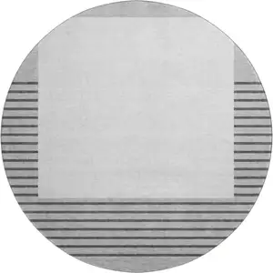 Photo of 8' Gray Silver And Charcoal Striped Washable Round Rug With UV Protection
