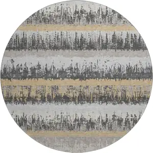 Photo of 8' Gray Silver And Charcoal Striped Washable Round Rug With UV Protection