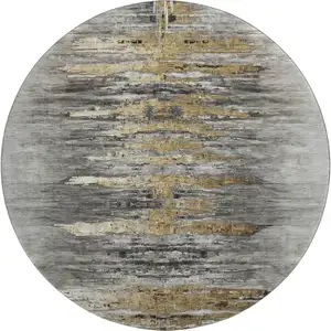 Photo of 8' Gray Silver And Gold Abstract Washable Round Rug With UV Protection