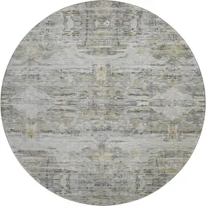 Photo of 8' Gray Silver And Gold Abstract Washable Round Rug With UV Protection