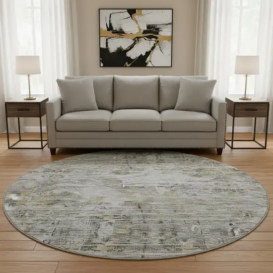 8' Gray Silver And Gold Abstract Washable Round Rug With UV Protection Photo 2