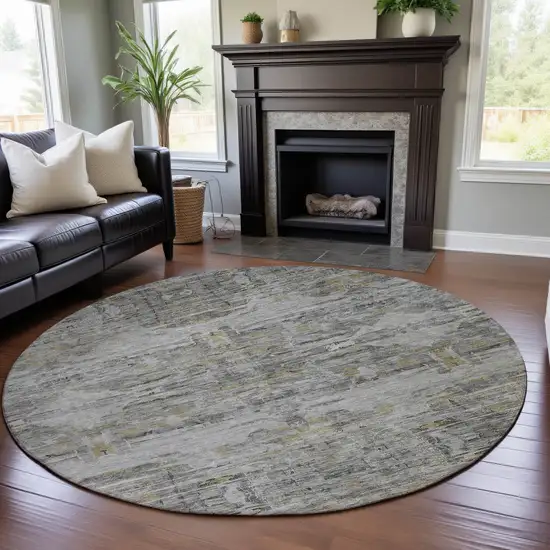 8' Gray Silver And Gold Abstract Washable Round Rug With UV Protection Photo 4