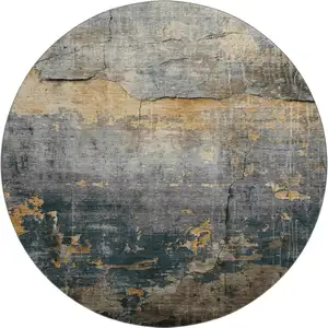 Photo of 8' Gray Silver And Gold Abstract Washable Round Rug With UV Protection