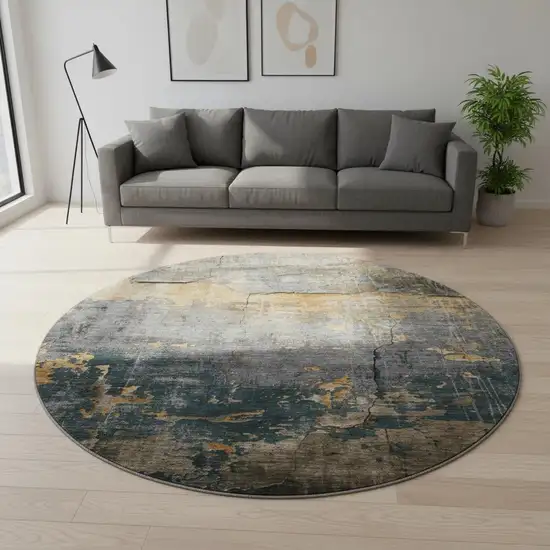 8' Gray Silver And Gold Abstract Washable Round Rug With UV Protection Photo 2