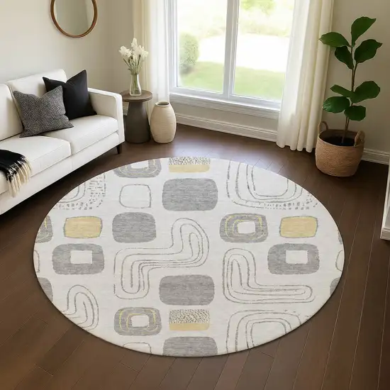 8' Gray Silver And Gold Geometric Washable Round Rug With UV Protection Photo 4