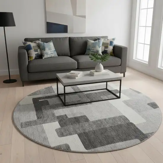 8' Gray Silver And Ivory Abstract Geometric Washable Round Rug With UV Protection Photo 2