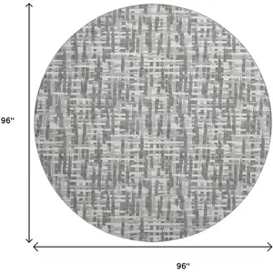 Photo of 8' Gray Silver And Ivory Abstract Geometric Washable Round Rug With UV Protection