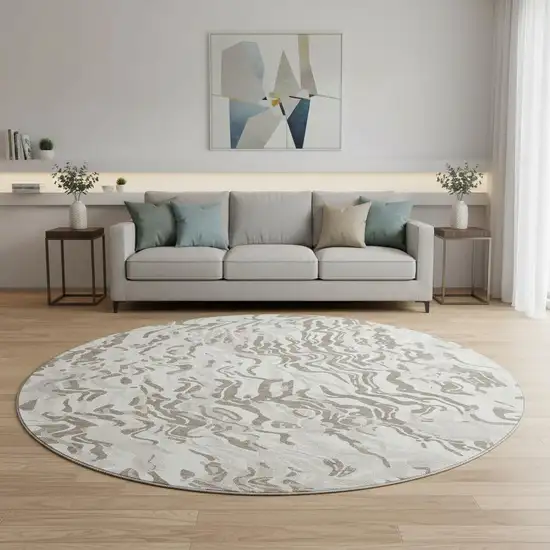 8' Gray Silver And Ivory Abstract Washable Round Rug With UV Protection Photo 2