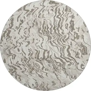 Photo of 8' Gray Silver And Ivory Abstract Washable Round Rug With UV Protection