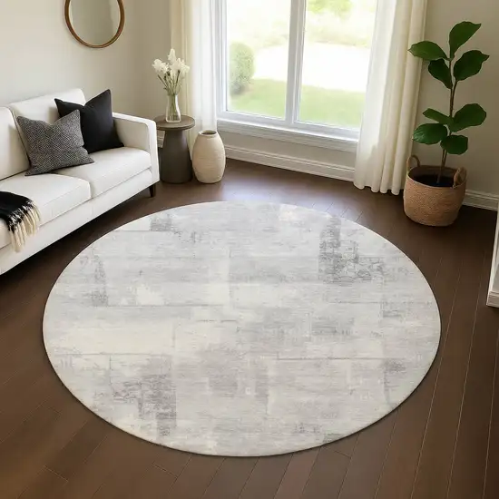 8' Gray Silver And Ivory Geometric Washable Round Rug With UV Protection Photo 4