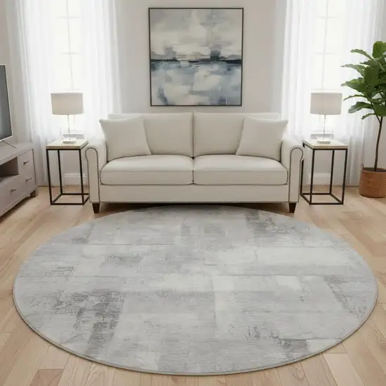 8' Gray Silver And Ivory Geometric Washable Round Rug With UV Protection Photo 2