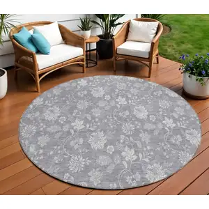 Photo of 8' Gray Silver And Ivory Round Floral Washable Indoor Outdoor Area Rug