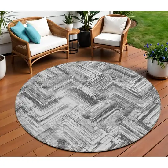 8' Gray Silver And Ivory Round Geometric Washable Indoor Outdoor Area Rug Photo 1