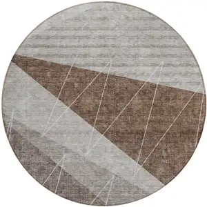 Photo of 8' Gray Silver And Taupe Round Geometric Washable Indoor Outdoor Area Rug