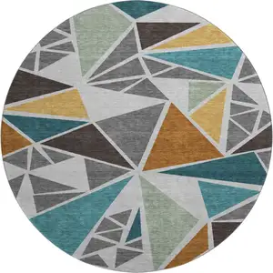 Photo of 8' Gray Teal And Copper Geometric Washable Round Rug With UV Protection