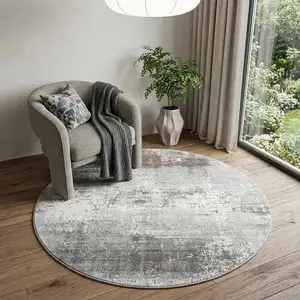 Photo of 5' Gray White And Brown Abstract Washable Round Rug With UV Protection