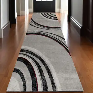 Photo of 20' Gray and Black Abstract Power Loom Distressed Runner Rug