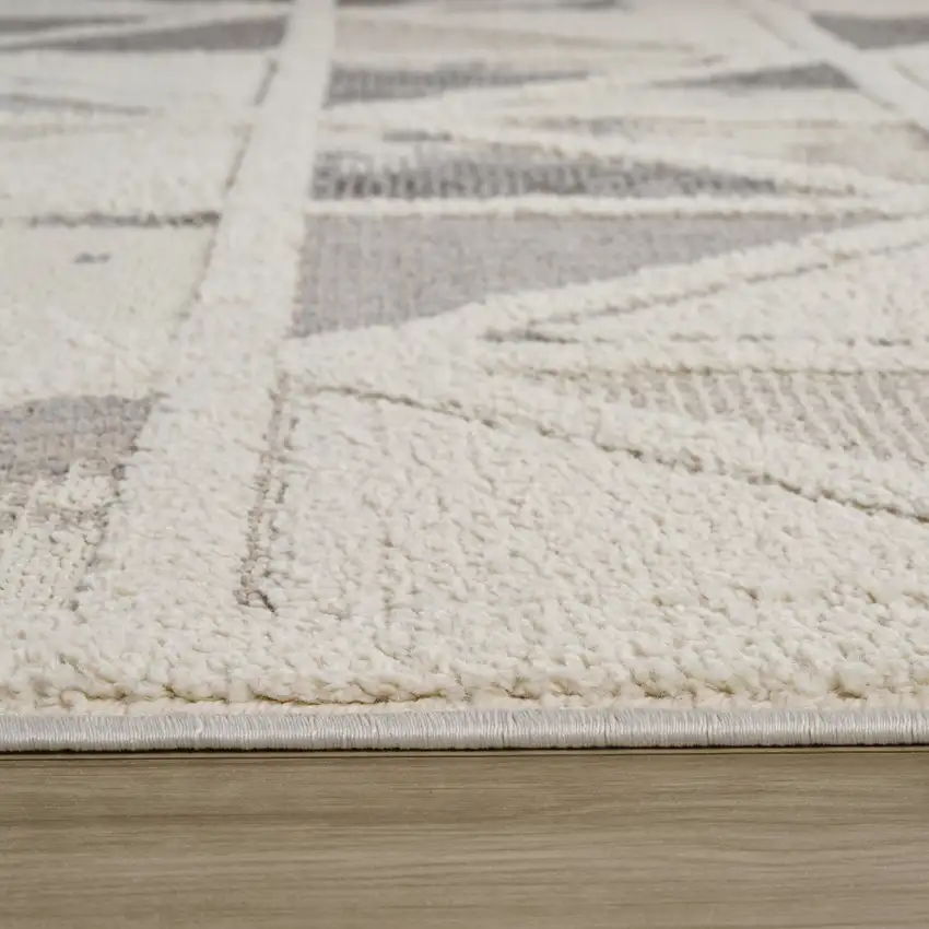 8' Gray and Cream Geometric Distressed Area Rug Photo 8