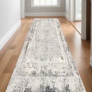 Photo of 15' Gray and Ivory Abstract Distressed Runner Rug