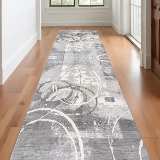 20' Gray and Ivory Abstract Power Loom Distressed Runner Rug Photo 1