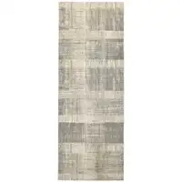 Photo of 8' Gray and Ivory Abstract Runner Rug