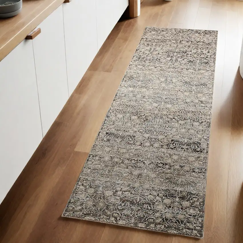 8' Gray and Ivory Oriental Power Loom Distressed Runner Rug With Fringe Photo 1