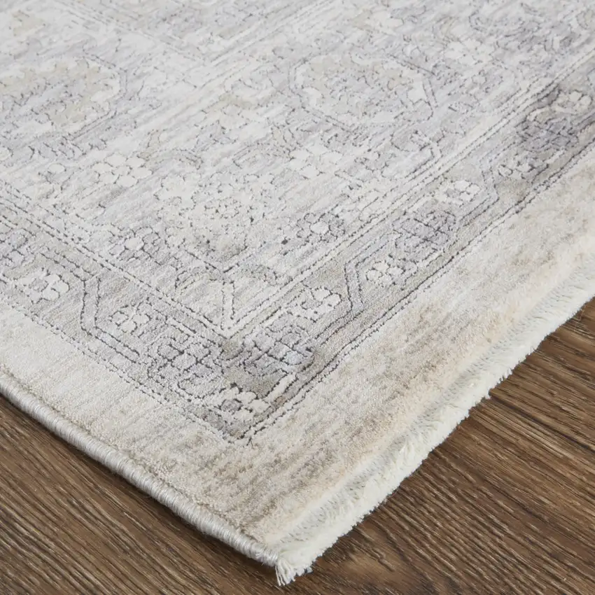 12' Gray and Ivory Oriental Power Loom Worn Faded Runner Rug With Fringe Photo 4