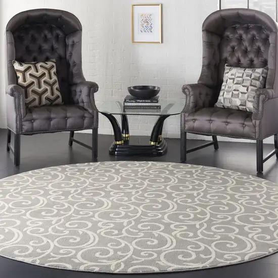 8' Gray and Ivory Round Floral Vines Power Loom Area Rug Photo 4