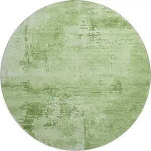 Photo of 8' Green And Beige Abstract Washable Round Rug With UV Protection