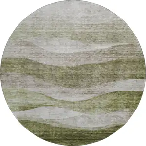Photo of 8' Green And Beige Abstract Washable Round Rug With UV Protection