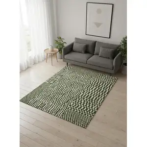 Photo of 8' Green And Beige Geometric Berber Washable Round Rug With UV Protection