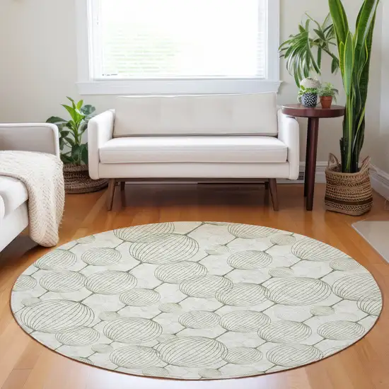 8' Green And Beige Geometric Washable Round Rug With UV Protection Photo 5